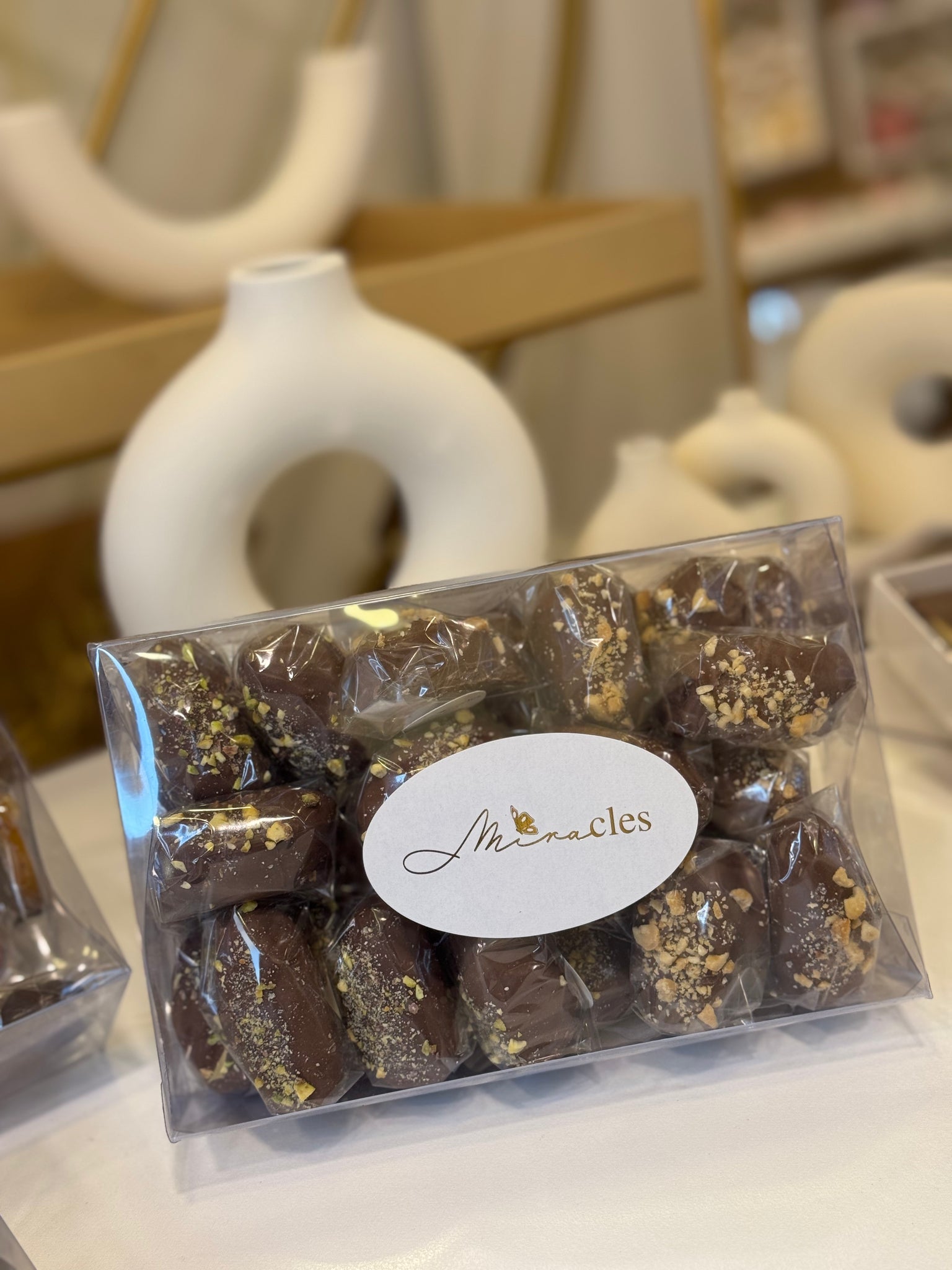 1kg Madjoul Dates dipped in milk chocolate mixed peanuts and pistachio